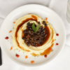 Kartoffelpüree mit brauner Sauce und schwarzen Bohnen 25 servings - Mashed Potatoes with black beans and red pepper, with gravy